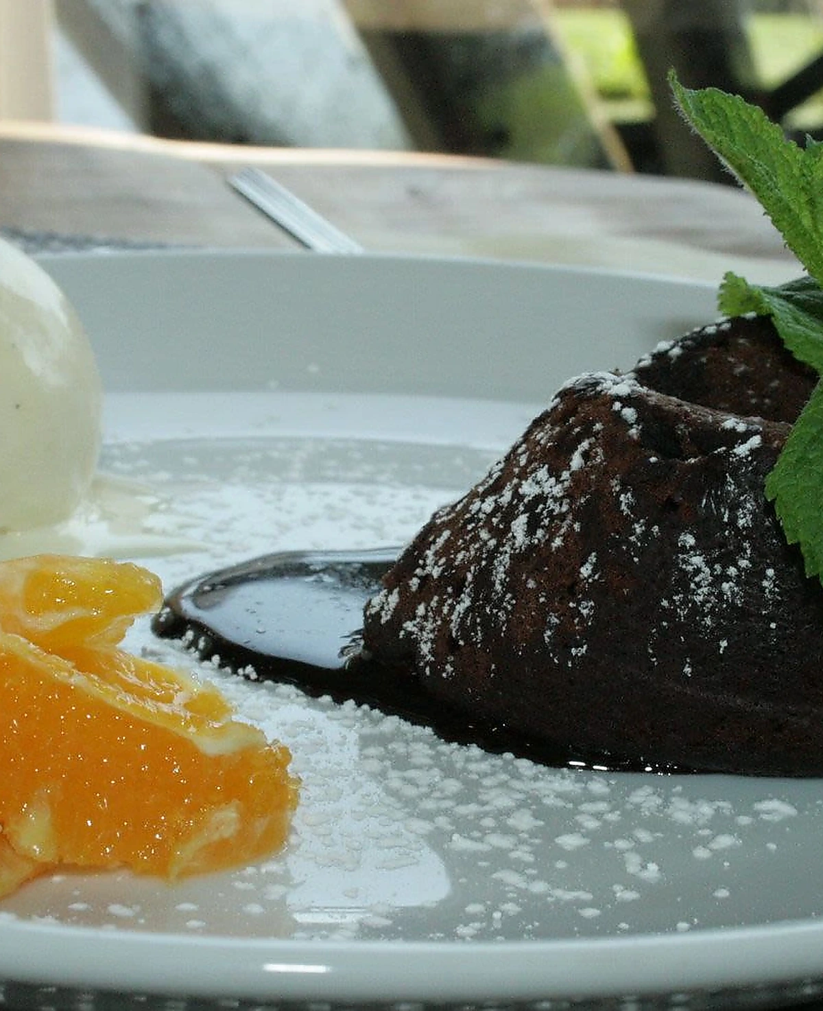 Warm chocolate dessert with vanilla ice cream